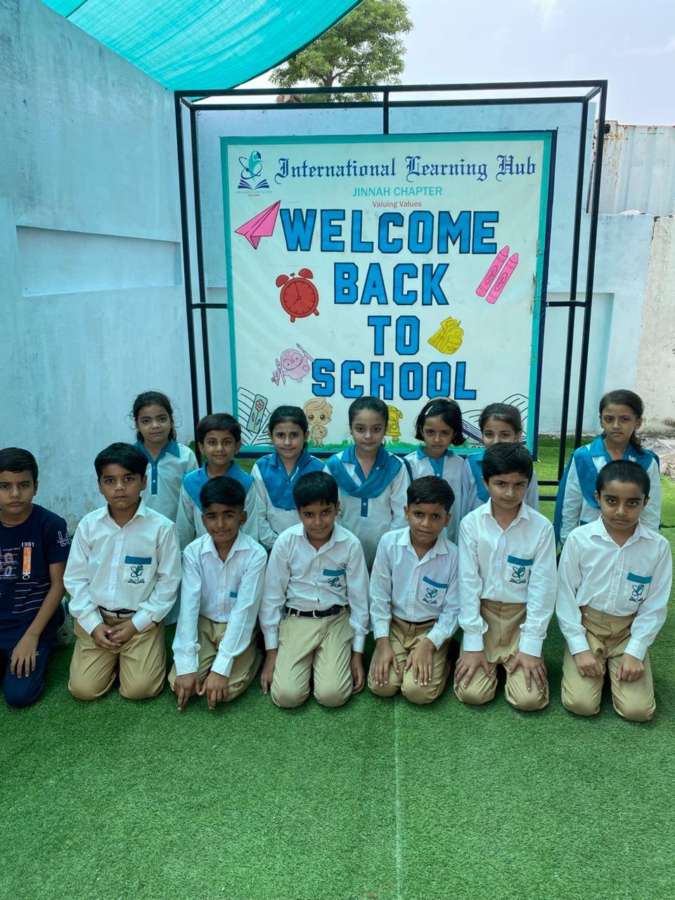 May be an image of 12 people, people playing football and text that says "o SA Internafional Tearning Hub JINNAH JINNAHCHAPTER CHAPTER WELCOME ValuingValues taloues BACK TO SCHOOL"
